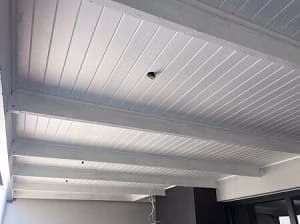 Isoboard fitted between exposed beams